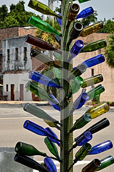 Multi-colored glass bottle tree