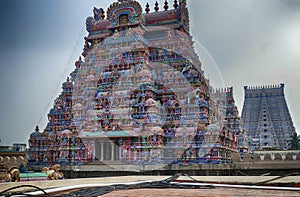 Multi colored gods and goddesses adorn the gopuram