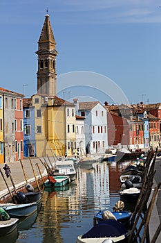 multi colored homes on canals