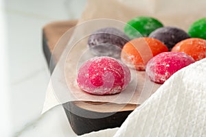 Multi-colored Japanese cakes Mochi in a white plate