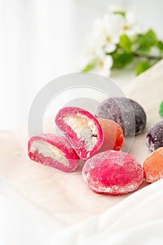 Multi-colored Japanese cakes Mochi in a white plate