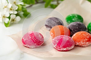 Multi-colored Japanese cakes Mochi in a white plate