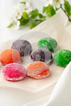 Multi-colored Japanese cakes Mochi in a white plate