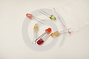 Multi-colored LEDs. Old LEDs on a white background