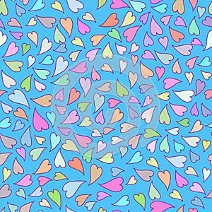Multi-colored lovely hearts on a blue background.