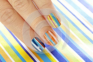 Multi-colored manicure on short nails