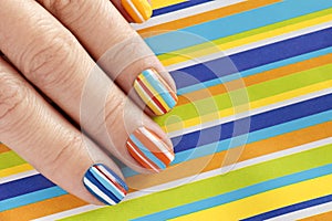 Multi-colored manicure on short nails