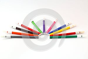 Multi-colored markers for drawing. Markers on a white isolated background