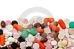 Multi-colored medical tablets and capsules on a white background close-up. Medicines. Medicine. Health. Tablet isolate