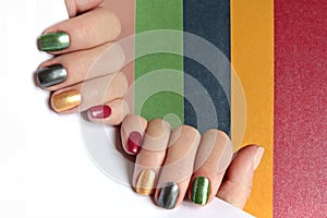 Multi-colored mother of pearl manicure on short nails.Nail art.