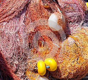 Multi-colored nylon fishing nets and floats