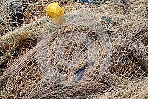 Multi-colored nylon fishing nets and floats