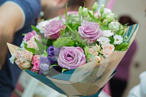 Multi-colored paper bouquet blurrd backgrounds . Rosa Mainzer Fastnacht