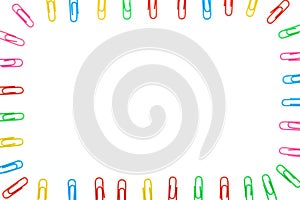 Multi-colored paper clip top view On White background