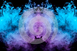 A multi-colored pattern of purple and blue smoke of a mystical shape in the form of a ghost`s head or a strange creature on a