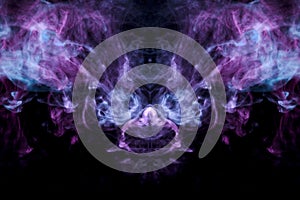 A multi-colored pattern of purple and blue smoke of a mystical shape in the form of a ghost`s head or a strange creature on a