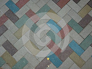 Multi-colored paving slabs