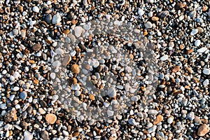 Multi-colored pebbles on the beach