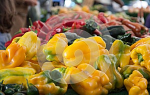 Multi-colored pile of bell peppers at farmer's market