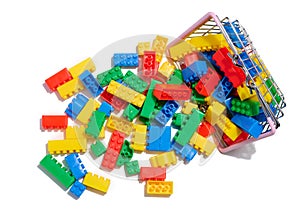 Multi-colored plastic cubes of a children's designer on a white isolated background
