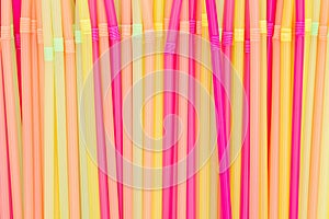 Multi colored plastic straws background