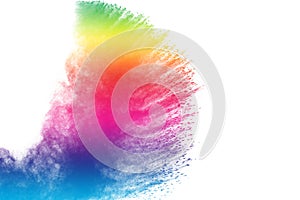 Multi colored powder explosion on white background.