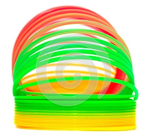 Multi-colored rainbow spring on a white background