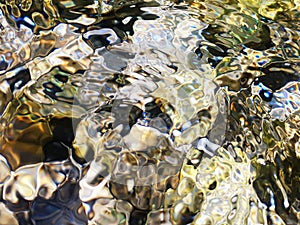 Multi-colored river stones. Background of colored sea stones close-up