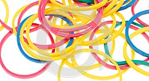 Multi-colored rubber bands isolated on white background.