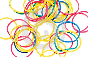 Multi-colored rubber bands isolated on white background.