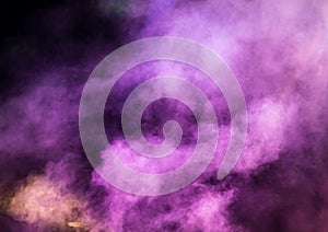 Multi-colored smoke at the concert at night