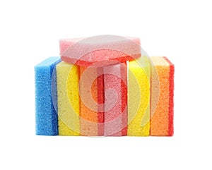 Multi-colored sponges isolated on white background. Set of Foam sponges for washing dishes. Close-up photo.