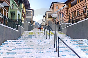 Multi-colored staircase on the street of the ski resort Krasnaya Polyana, Sochi