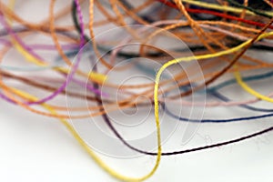 Multi-colored tangled colorful needlecraft silk thread rope. Mac