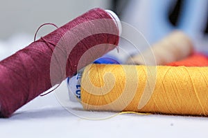 Multi colored threads used for sewing