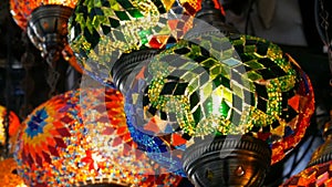 Multi-colored Turkish mosaic lamps on ceiling market in the famous Grand Bazaar in Istanbul, Turkey