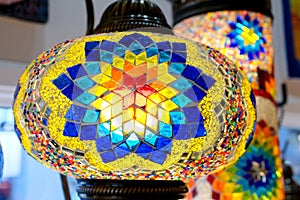 Multi-colored Turkish mosaic lamps on the ceiling market in the famous Grand Bazaar in Istanbul, Turkey