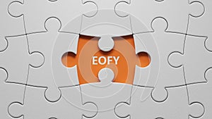 multi-colored puzzle pieces with the text EOFY.
