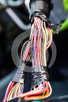 Multi-colored wires taped together