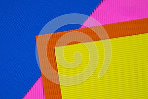 Multi coloured corrugated paper texture, use for background. vivid colour with empty space for add text or object