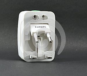 Multi country Travel adapter isolated on white background, lot of space for advertisement