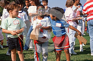 Multi-cultural boys at park