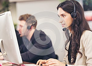 Multi-Cultural Business People Working In A Call Center, Online customer care support service