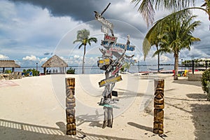 Multi-directional sign on beach in Florida Keys