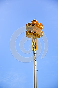 Multi directional yellow round amplified emergency siren