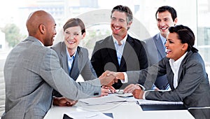 Multi-ethnic business people greeting each other