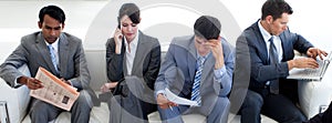 Multi-ethnic business people in a waiting room