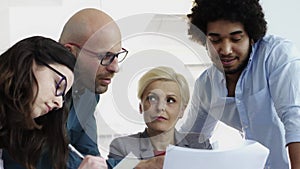 Multi Ethnic Business Team having a meeting in the office