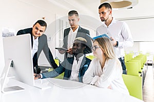 Multi ethnic business team having meeting or presentation in modern office