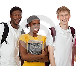 Multi-ethnic college students/friends with backpacks and books o